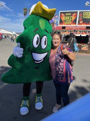 Taken at the Santa Rosa Fair a mask out walking around from a business saying hello and taking pictures with everybody