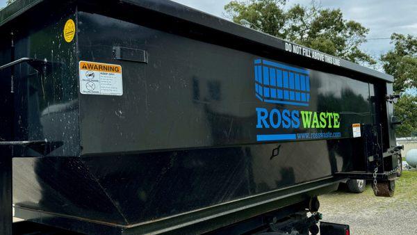 Ross Waste 10 Yard Dumpster on the back of the truck