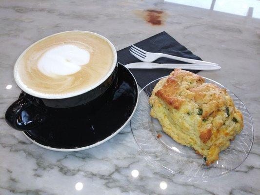 Vanilla Latte and jalapeno cheese scone. Both excellent and very enjoyable. About $8.50.