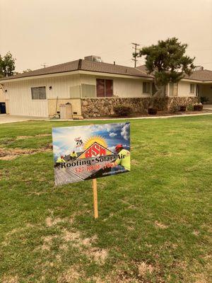 Yard sign of a Shingle Install