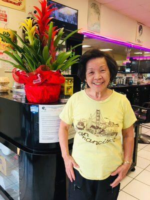 A happy grandma with her first happy experience at Fancy Hair Salon