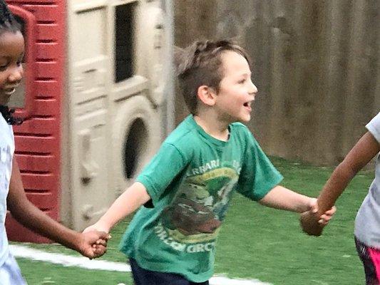 Two artificial turf playgrounds for child safety, cleanliness, & FUN!