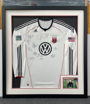 Signed DC United Jersey with double mat, floating on a black mat, awaiting Museum glass. The Customer loved it!