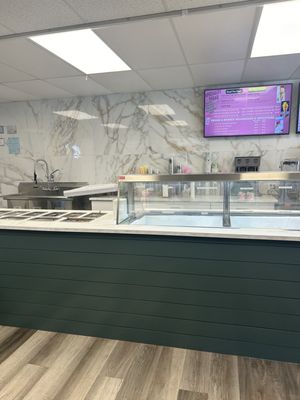 Counter w ice cream and topping area