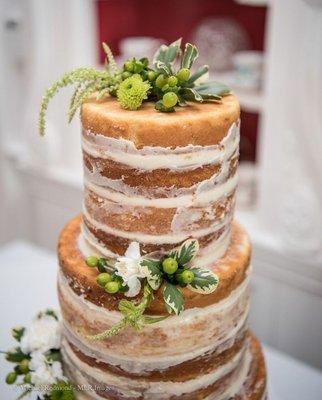 Our floral touches on a 'naked' wedding cake- modern and beautiful!