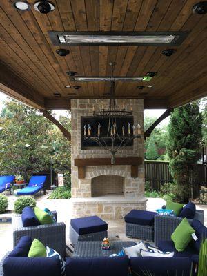 Patio TV with in ceiling surround sound with an in ceiling subwoofer.