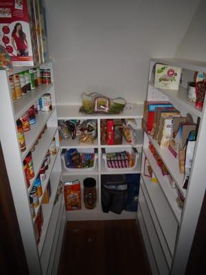 What used to be an awkward unusable space is now an under the stairs pantry!