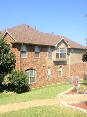 GAF Barkwood HD. New gutters, window beading, and exterior painting completed.