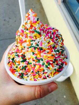 Large soft serve swirl with rainbow jimmies