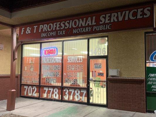 Store Front. This plaza is L shaped and this business is on the left side of the market.