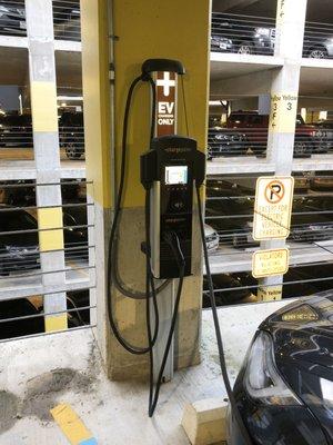 Electric Car Charging Stations are located in Daily parking on the 3rd level in the Yellow Section, aisle E. Charging fee of $5/charge.