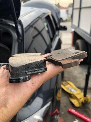 Difference in worn, razor-thin brake pads to new brake pads.