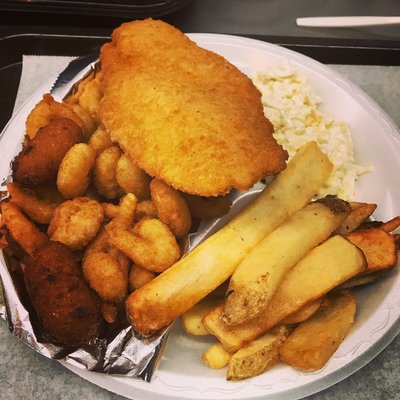 Seafood combo w/ flounder, shrimp, steak fries and slaw.