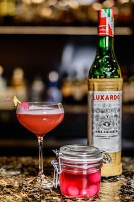 Pink Lady Bacardi Light Rum, Luxardo Maraschino Liqueur, pineapple juice, pomegranate juice