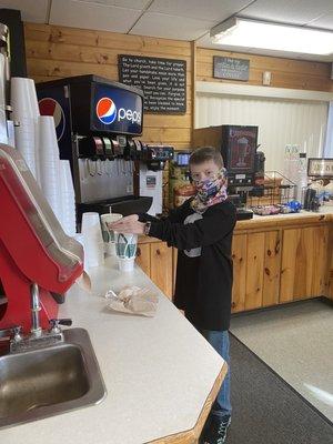 Opie grabbing some cold ones for the road! 44oz sodas from Mitchell's! Don't forget your punch cards!