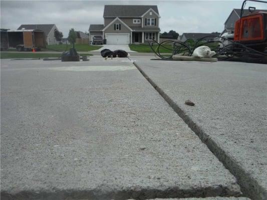 We used PolyLEVEL on this Richland, MI driveway to raise each of the three affected slabs and restore it to working order.