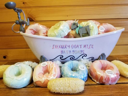 Goat milk bathbombs with cocoa butter icing.