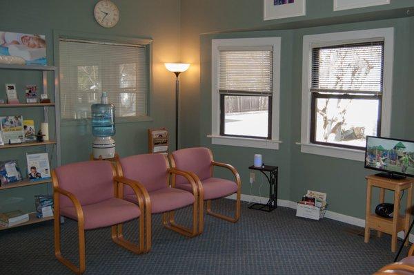 Comfortable waiting room with soft music and infused healing essential oils.