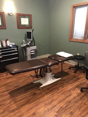 Exam room, the adjustment table front and center