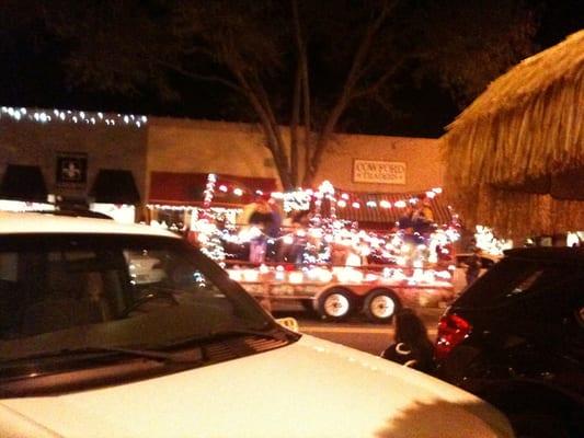 Parade of trucks during luminaria