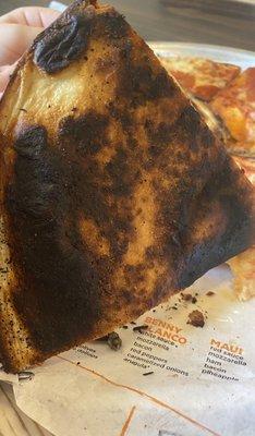 Horrible.. burnt charred pizza