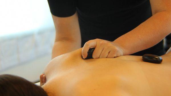 Hot Stone Therapy is a style of massage where heated stones are placed at specific sites on your body to deepen relaxation.