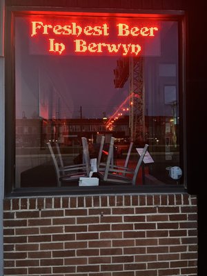 Left side front window of Flapjack Brewery.