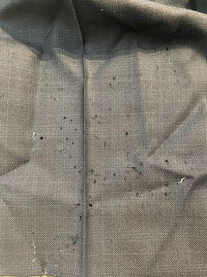 Suit pants with holes