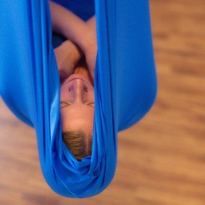 Shavasana in the Aerial Yoga class.