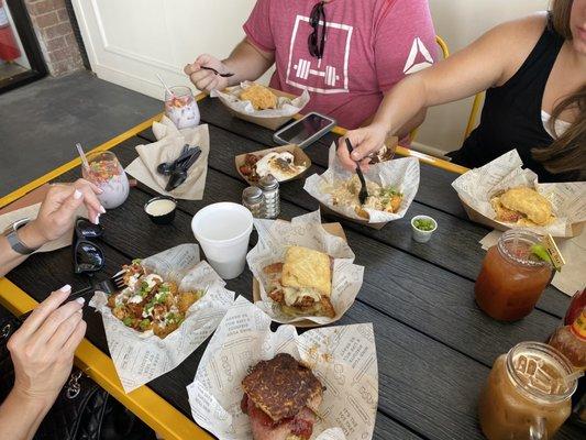 Fully Loaded Tots (left), Holiday Style Tots, Southern Style Tots, a couple HOSS, Monte Cristo, Bacon Egg + Cheese, Hot Chocolate