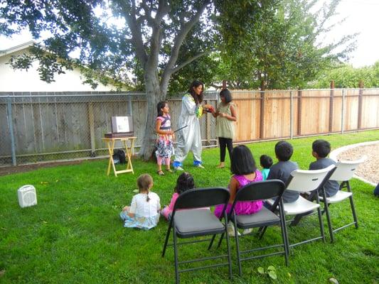 Shereen performing a magic show