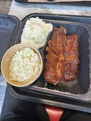 Full rack of pork ribs with two sides - mashed potatoes and cole slaw. They offered gravy for the potatoes but I declined.