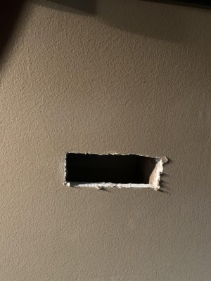 Hole left in wall from Geek Squad recommendation.