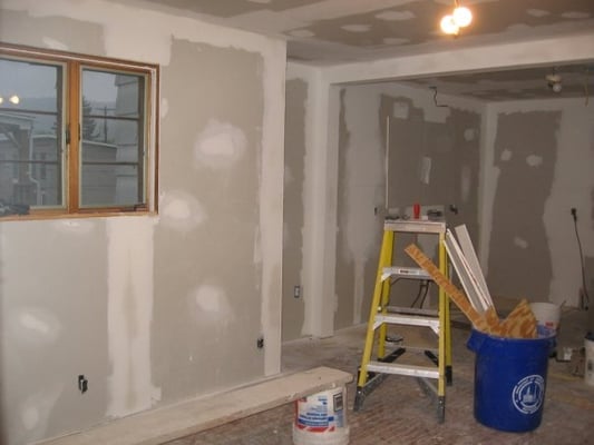 Drywall work during a kitchen renovation.