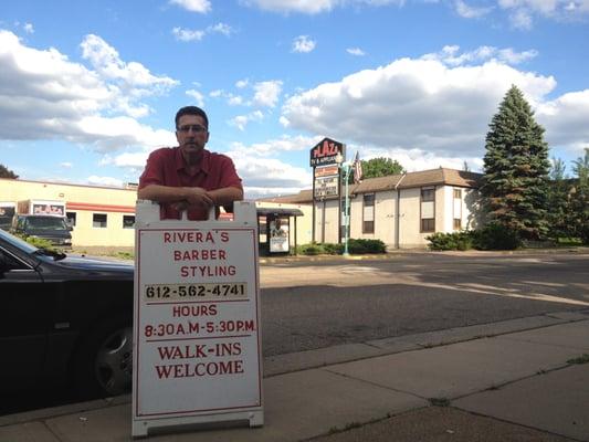 Jim Rivera, owner of Rivera's Barber Stylist, outside of his shop on June 1, 2012  (NOTE: from PREVIOUS Robert Street location)