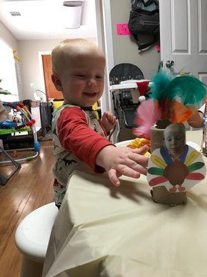 My little turkey at his school.  We loved the turkey head!