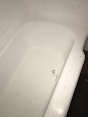 Disgusting tub, they painted it with wall paint. After scrubbing it to get it some what clean the paint comes off.