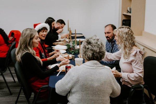 Team members chatting at our Christmas lunch!