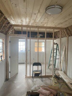 Wall and door framed and installed for friends child's room.