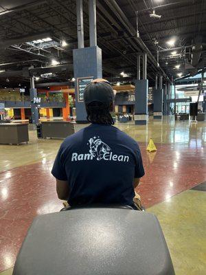 cleaning shopping mall with floor scrubber