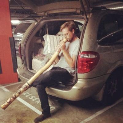 Ian jamming on a didgeridoo for some customers!