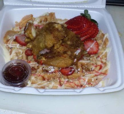 Worlds best CHICKEN N WAFFLE It was a strawberry cheese cake waffle they have NEW CHEF in there