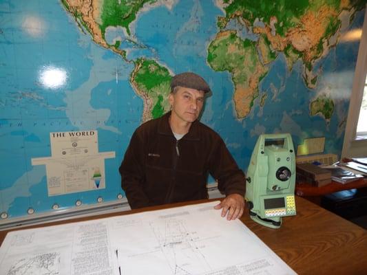 Roscoe Blaisdell in his office in Raymond, NH