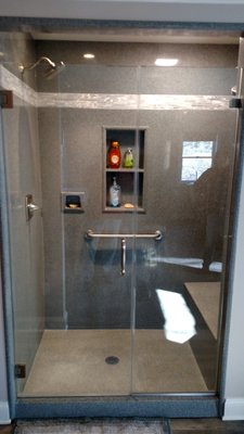 Cultured Granite shower w/ bench seat and recessed cubbie!