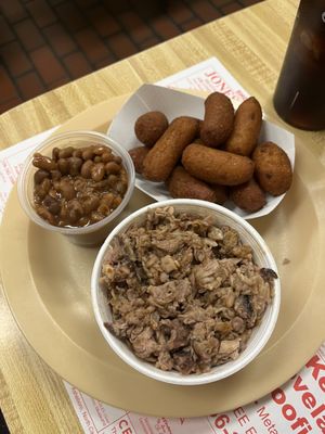 Chopped BBQ with hush puppies and bake beans