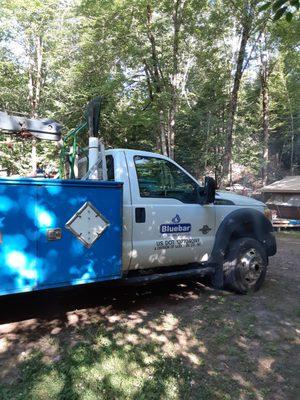 Blue bar Truck trying to repo our gas tanks still filled with gas.