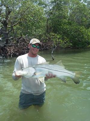 Capt. Ben Geroy with a large Naples snook