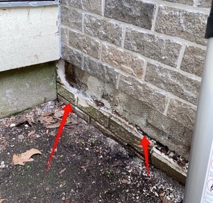 This chimney was recently refinished and it appears that a section of the veneer is missing. Water will eventually intrude inside.