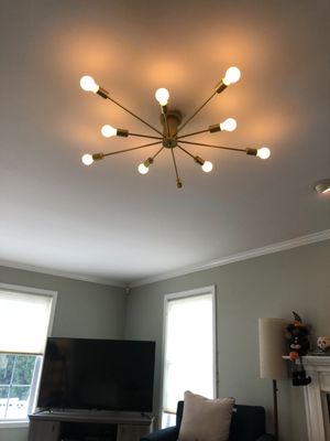 Removed existing and installed a new Franklyn Chandelier with LED dimmable bulbs.