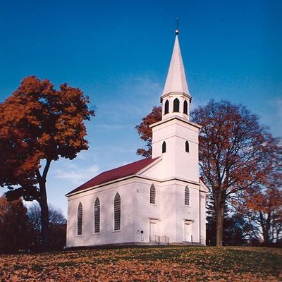 Built in 1810, the Old School Baptist Meeting House sits on a knoll in Lewis Park, and is one of the most iconic buildings in Warwick.